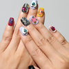 Model wearing colorful coffin Singapore press on nails with heart gems – handmade by naillover