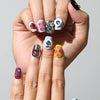 Close-up of Y2K style coffin nails with abstract art and gems – Singapore press on nails by naillover