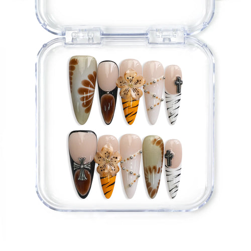 Naillover Singapore handmade stiletto press on nails featuring earthy tones, tiger stripes, 3D flower nail art, and crystals