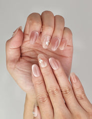 Close-up of Naillover Autumn Whisper Singapore press on nails featuring elegant ombre tones with leaf motif details.