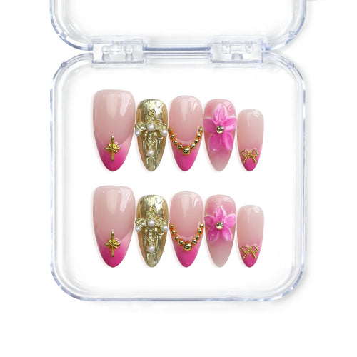 Naillover Singapore handmade pink press on nails featuring gold shimmer, 3D flower nail art, stars, and pearl accents