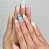 Model wearing Blossom Gradient 3D summer nails Singapore with pastel gradient colors