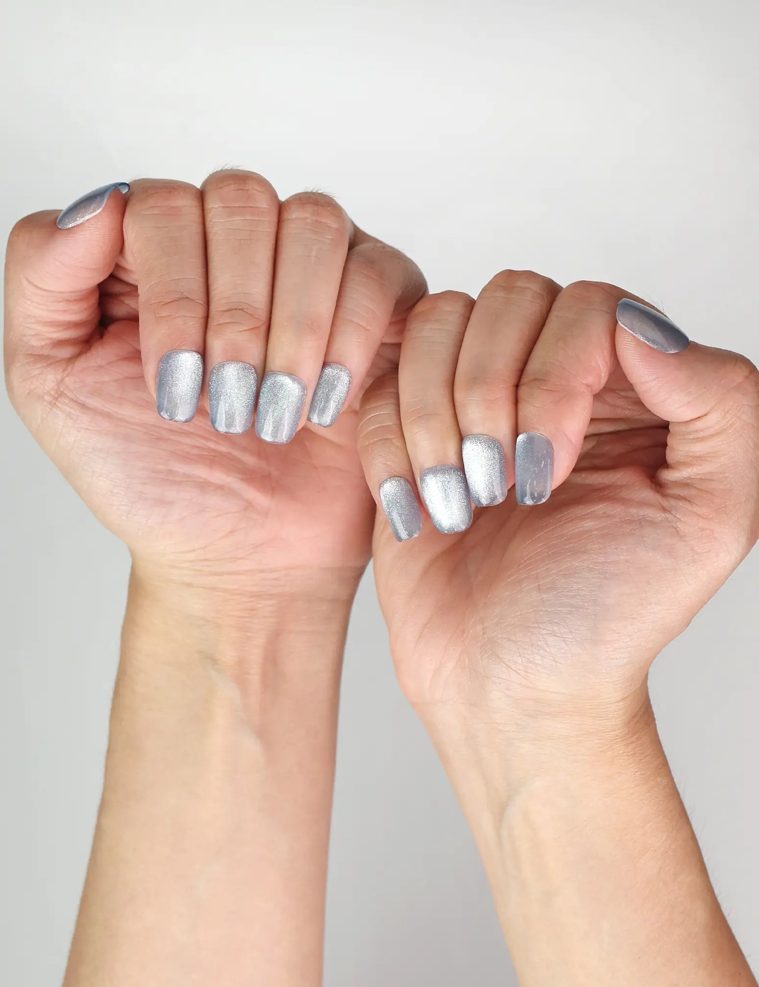 Naillover Singapore press on nails in Blue Luster cat eye style, trendy handmade manicure look
