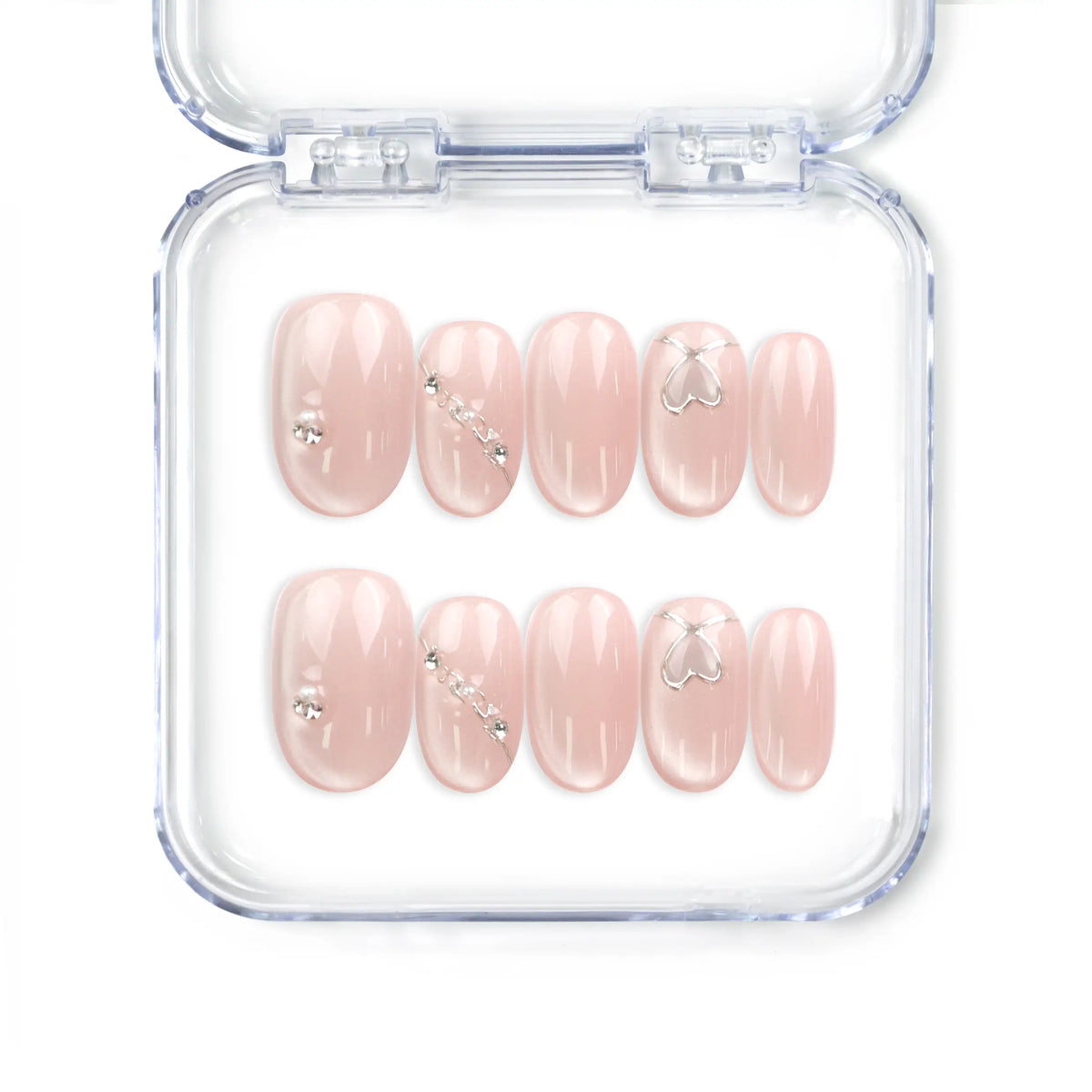 Blush Gleam Cat Eye Singapore press on nails by naillover, handmade press on nails with silver accents and shimmering cat eye finish.