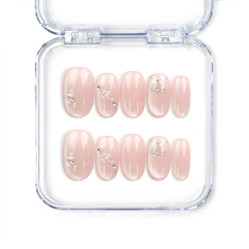 Blush Gleam Cat Eye Singapore press on nails by naillover, handmade press on nails with silver accents and shimmering cat eye finish.