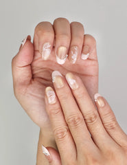 Close-up of Naillover Blush Latte Singapore press on nails featuring smooth ombre tones with elegant metallic line details.