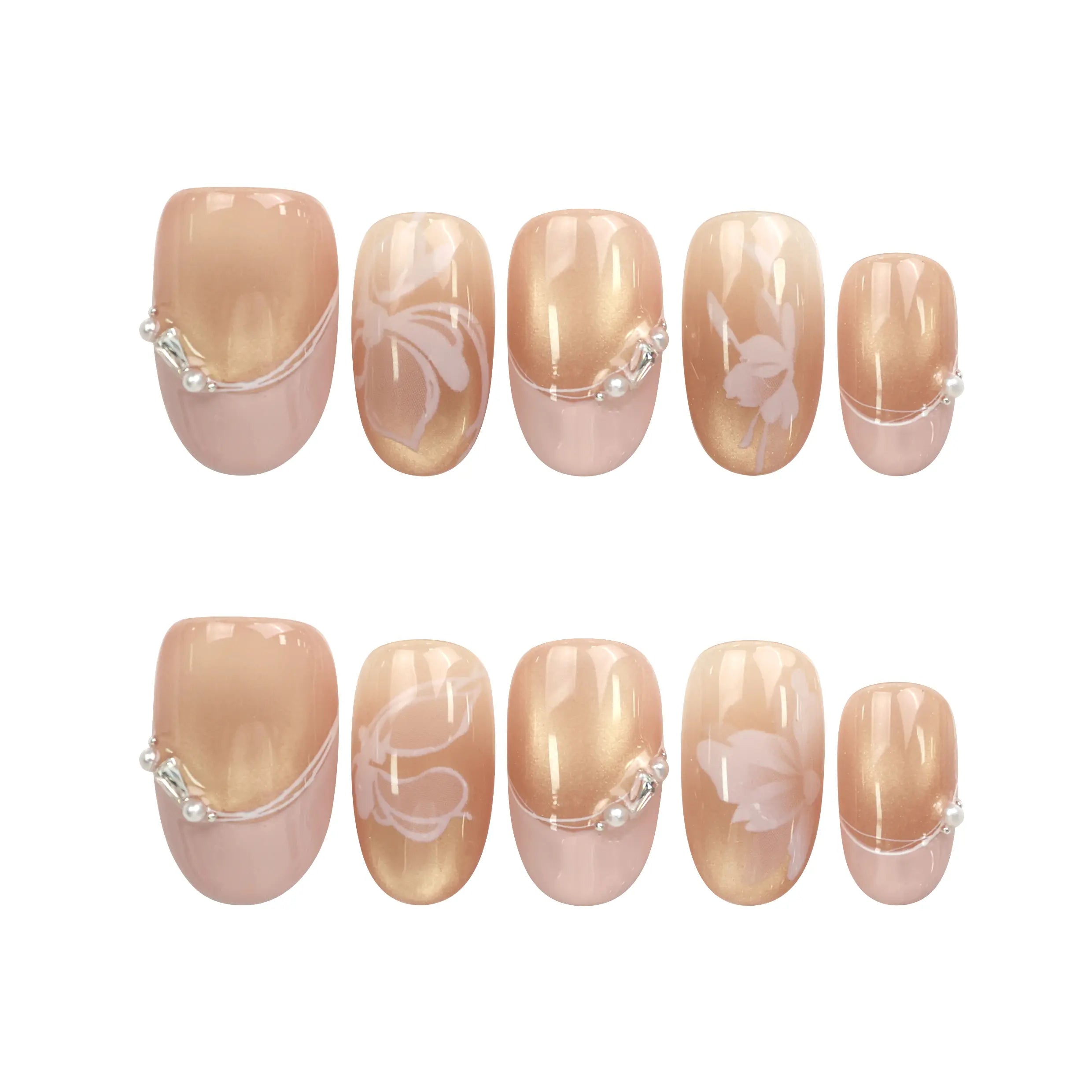 Flat lay of Naillover Blush Latte Singapore press on nails set, featuring handmade ombre nails with metallic stripes and pearlescent details.