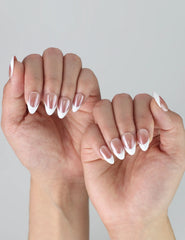 Side view of minimalist gradient press-on nails in short almond shape with natural earthy tones