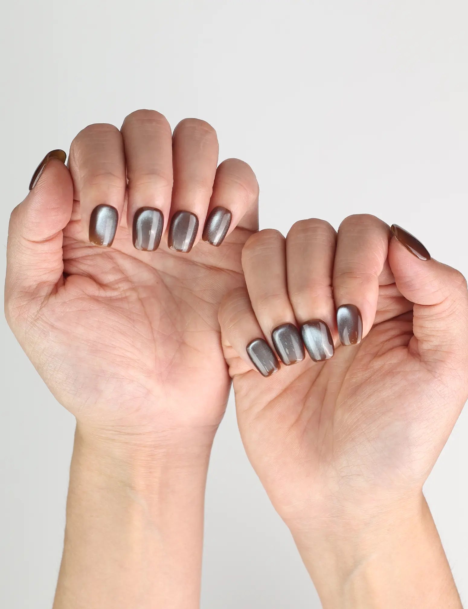 Naillover Bronze Fantasy press on nails Singapore styled on natural nails with elegant bronze glow