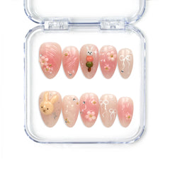 Naillover Bunny Blush handmade press on nails in pink with rabbit and floral designs, accented with gold details from Singapore press on nails collection.
