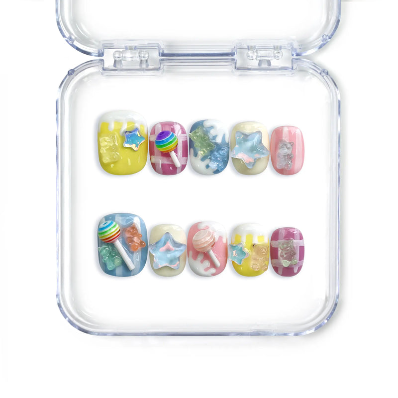 Naillover handmade short Singapore press on nails with pastel pink and blue ice cream and gummy bear details.