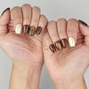 Elegant manicure look featuring Caramel Glaze cat eye press on nails Singapore handmade by Naillover.