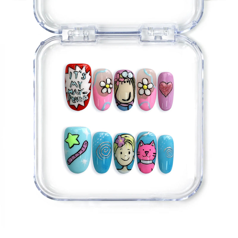 Colorful short oval press-on nails with doodles, smiley faces, and pop graphics from Singapore brand Naillover.