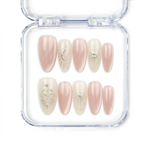 Naillover Celestial Pink handmade press on nails with pastel tones, gold stars, and heart accents displayed on white background