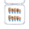 Medium blue almond press-on nails with gingham French tips and cherry accents, handmade in Singapore by Naillover.