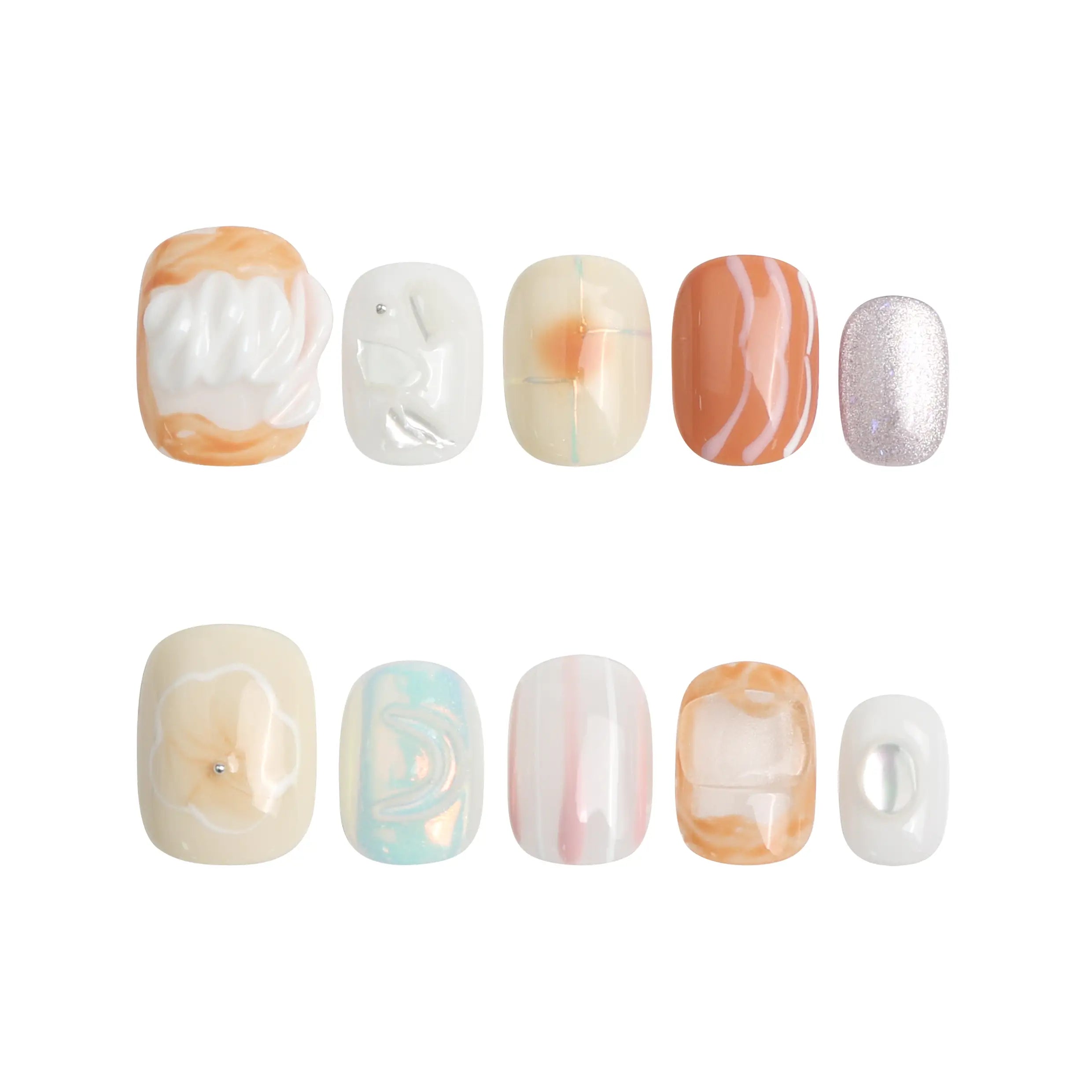 Product display of handmade press on nails inspired by coral reefs, with tropical peach and seafoam tones by Naillover