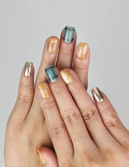 Hand wearing Cozy Plaid Glaze short coffin plaid press on nails with cat-eye shimmer, Naillover handmade nails Singapore