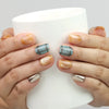 Hand holding a cup while wearing Naillover Cozy Plaid Glaze plaid short coffin press on nails with cat-eye shimmer, Singapore handmade nails