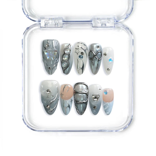 Naillover Singapore handmade press on nails in blue almond shape with pearly shimmer and 3D crystal accents