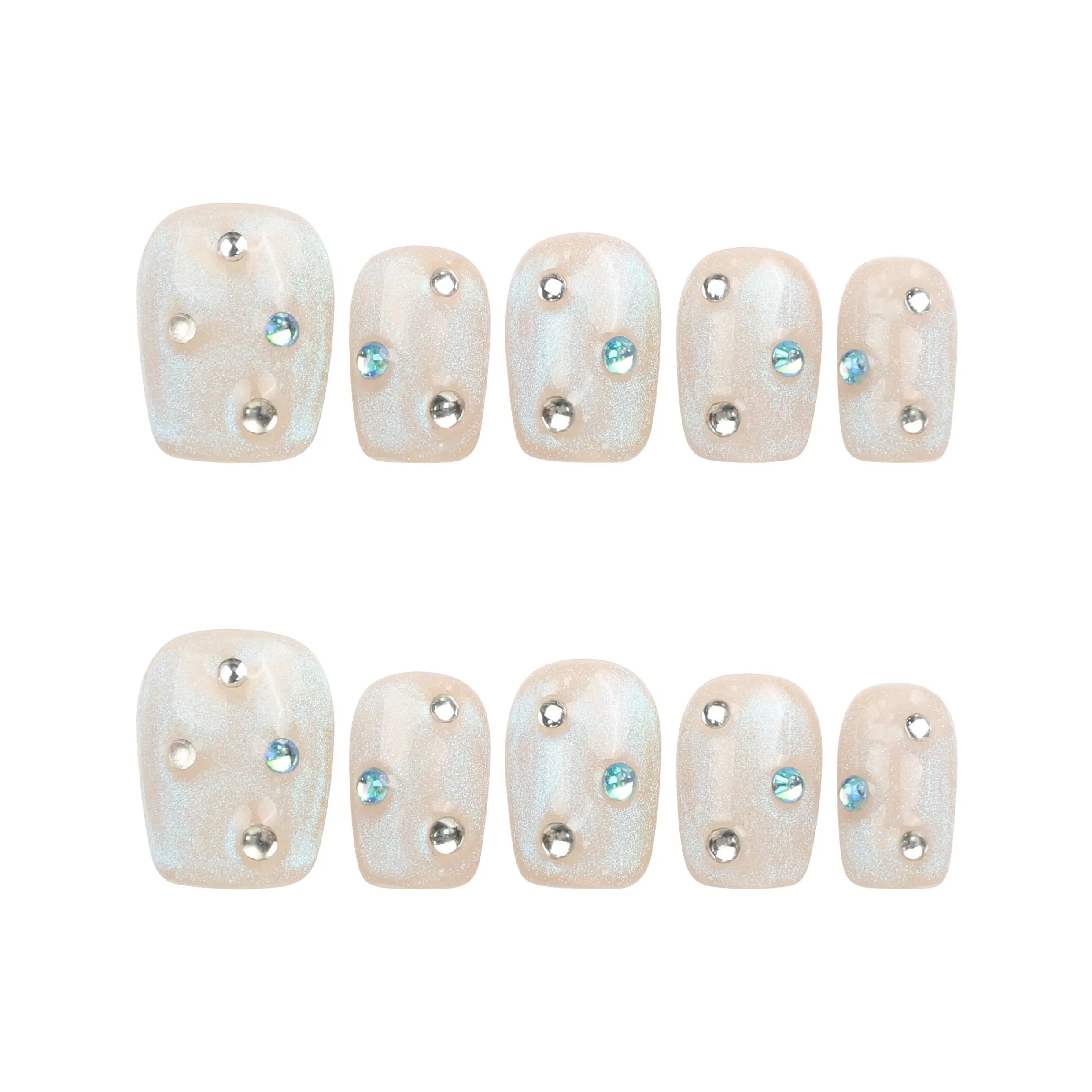 Crystal Dust nude short Singapore press on nails with gem accents displayed on white background for a refined classic look