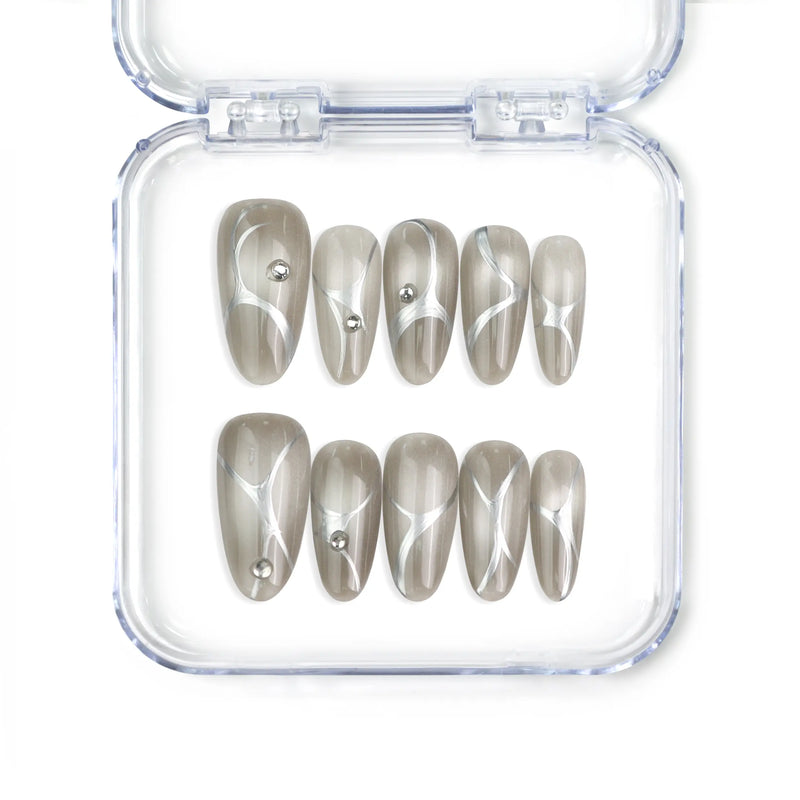 Singapore handmade silver medium press on nails with metallic chrome and gem details by naillover