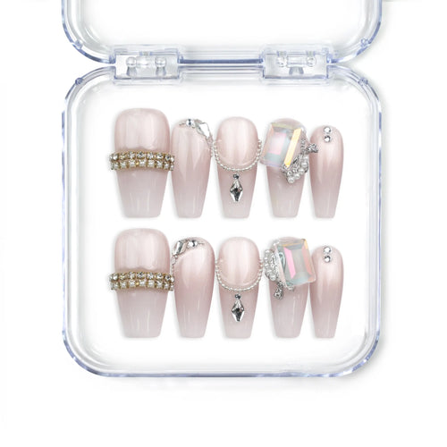 Dolce Peach Singapore press on nails in glossy pink coffin shape with silver chain accents by naillover