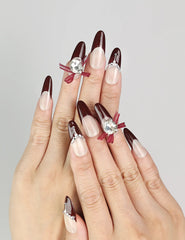 Model wearing Eternal burgundy press-on nails with silver accents, Singapore handmade nails by naillover