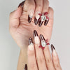 Close-up of Eternal classic burgundy press-on nails with silver details, handmade Singapore nails by naillover