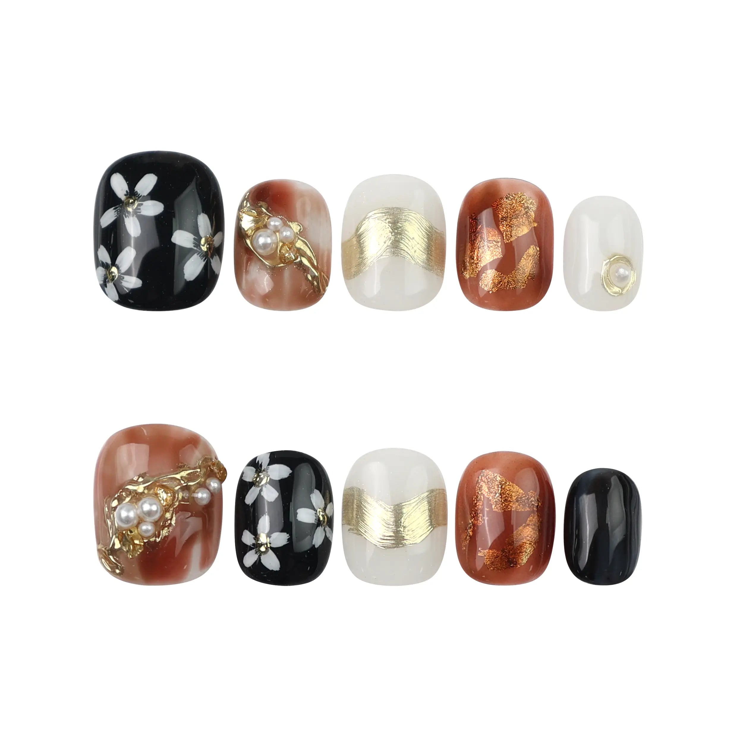 Flat lay of Floral Glow Naillover handmade press on nails on white background, displaying full set and embellishments clearly.