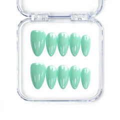 Naillover Singapore handmade short almond nails in glossy pastel green with a calming spring vibe