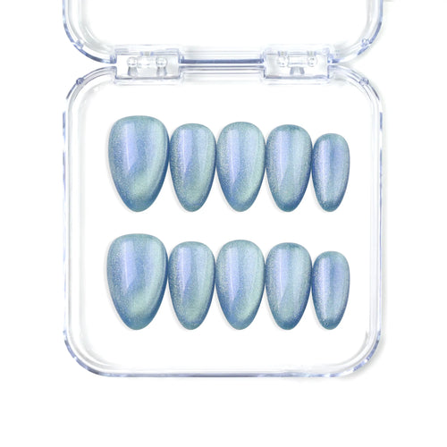 Naillover Frosted Skyline handmade blue press on nails with subtle cat eye shimmer, Singapore almond shape design.
