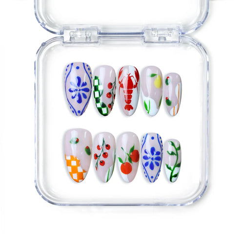 Singapore almond press on nails with cherries, daisies, and pastel floral patterns, handmade by Naillover