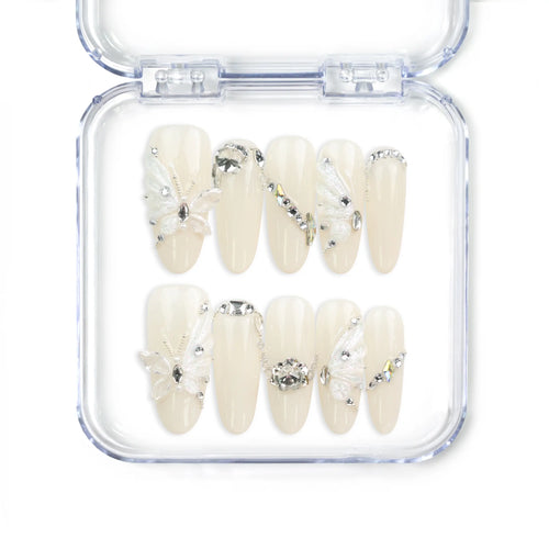 Glimmer Mirage translucent handmade Singapore press-on nails with silver glitter and butterfly accents by naillover