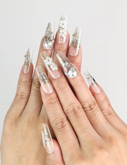 Model wearing Glisten Dream handmade Singapore press on nails with silver glitter and embellishments by naillover