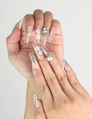 Close-up of Glisten Dream silver glitter Singapore press on nails on hands, handmade by naillover