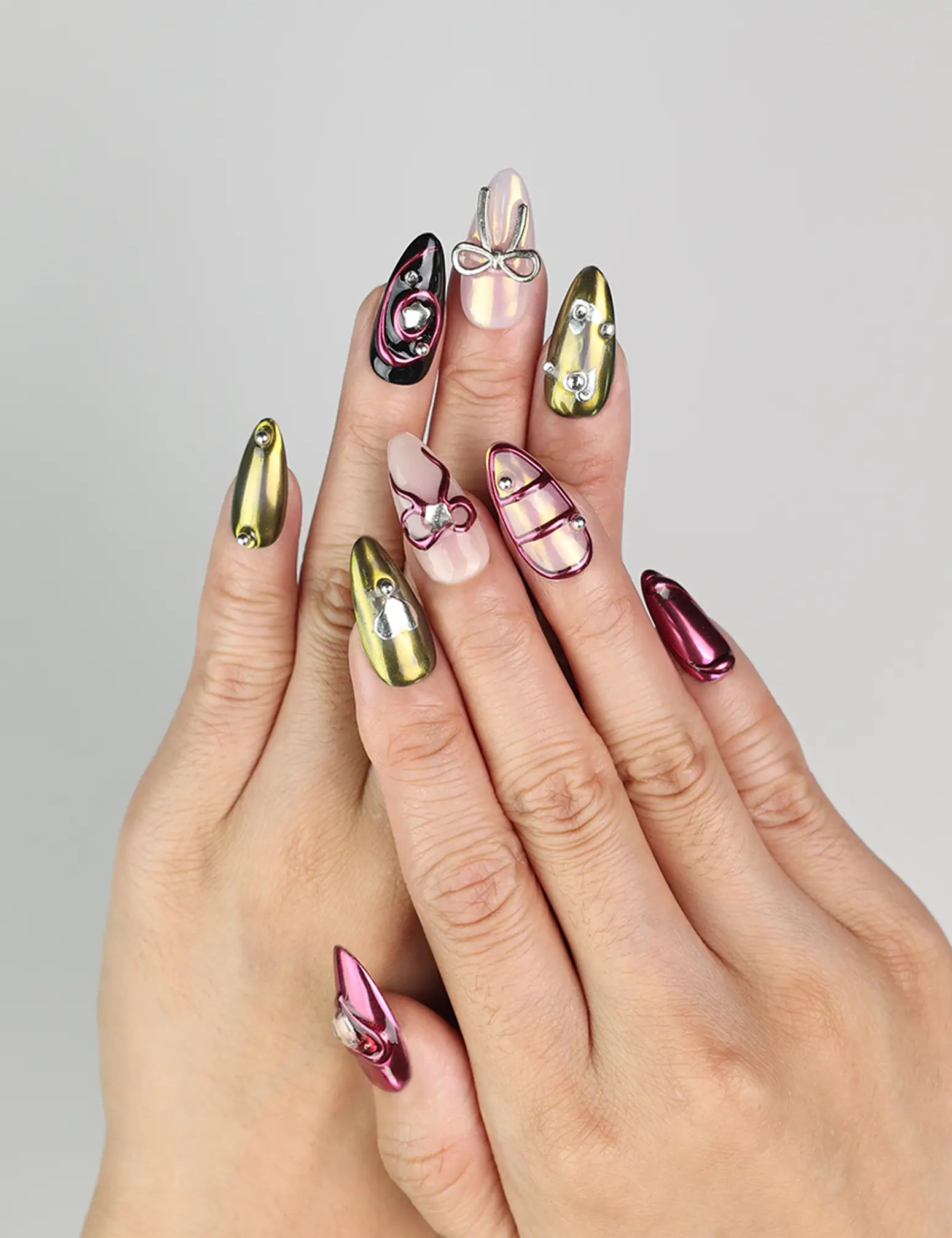 Model wearing Glossy Love coquette nails with glossy red and pink hearts, Naillover handmade Singapore press on nails.