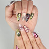 Close-up of Glossy Love coquette nails with heart and bow designs, trendy handmade press on nails Singapore.