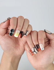 Hands fanned out to highlight handmade short square nails with a luxe gold gloss and soft caramel veining by Naillover