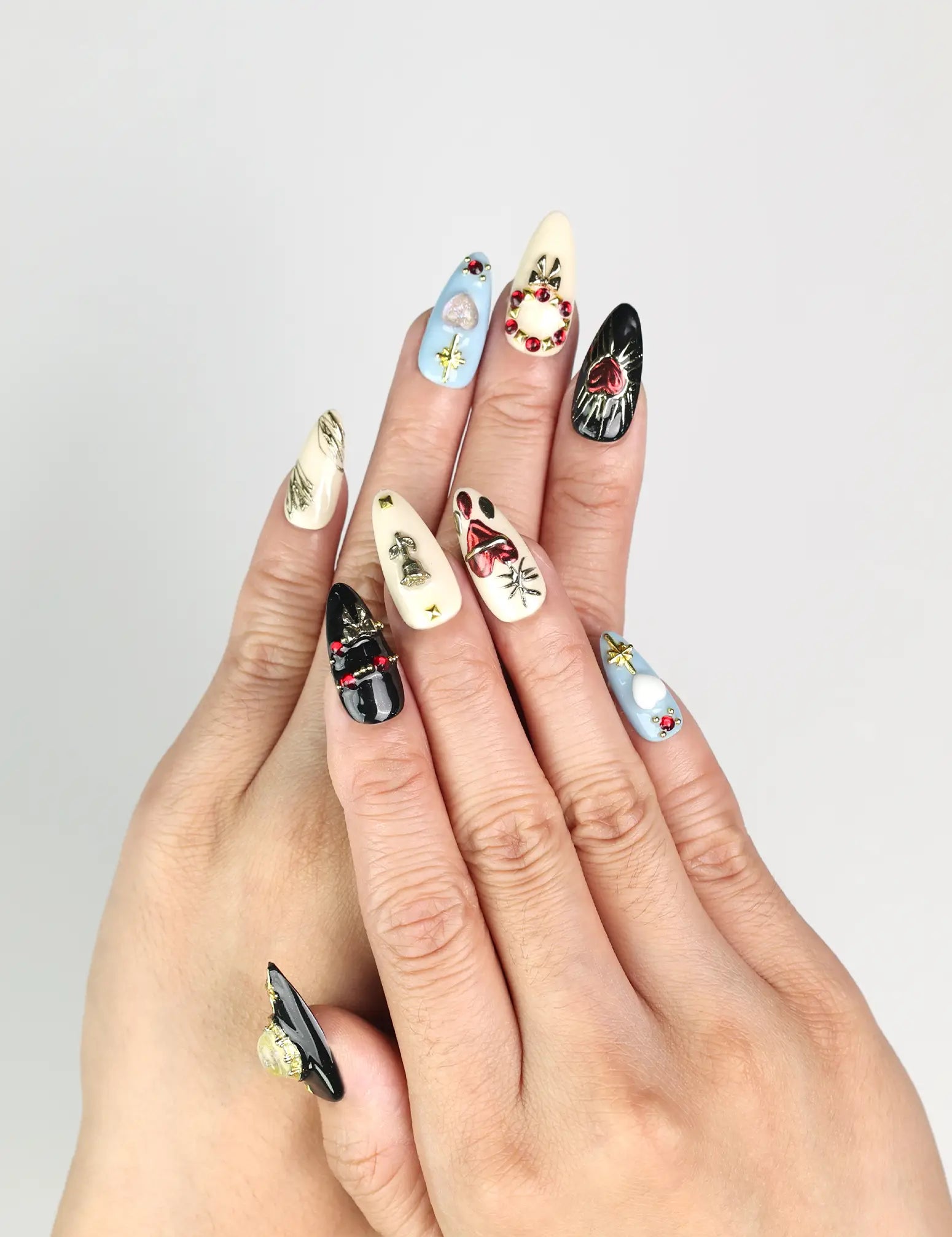 Model wearing Gothic Blossoms handmade Singapore press on nails with metallic roses and rhinestones, elegant and trendy by naillover