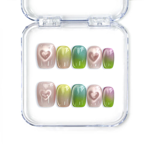 Gradient heart handmade press on nails in pastel colors with cat-eye heart details by naillover, Singapore press on nails