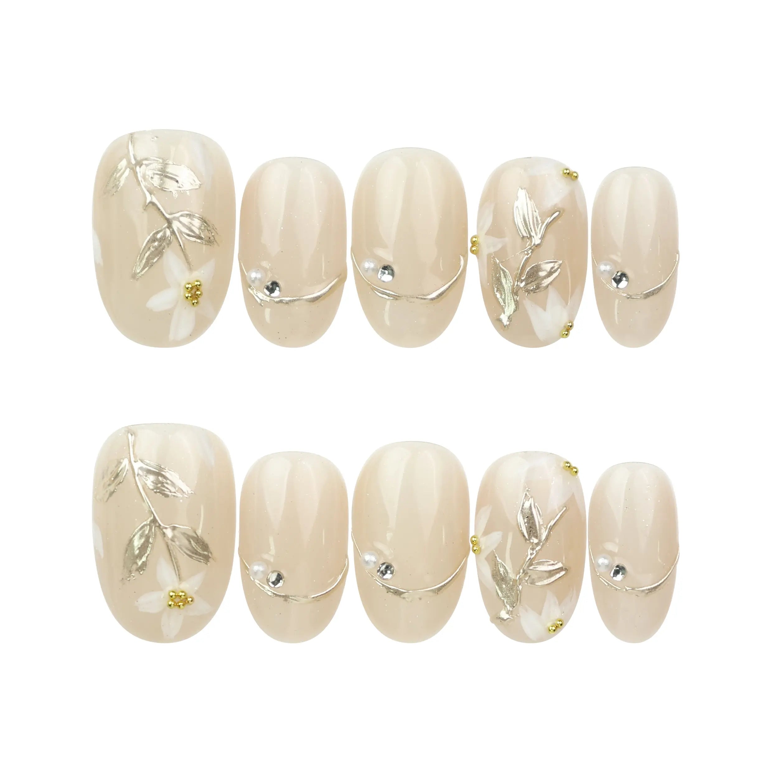 Ivory Bloom press on nails set on white background, featuring nude base, gold leaf, and floral details by NailLover.