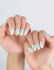 Side view of hands styled with Jade Curve press on nails by Naillover, perfect blend of nature and elegance.