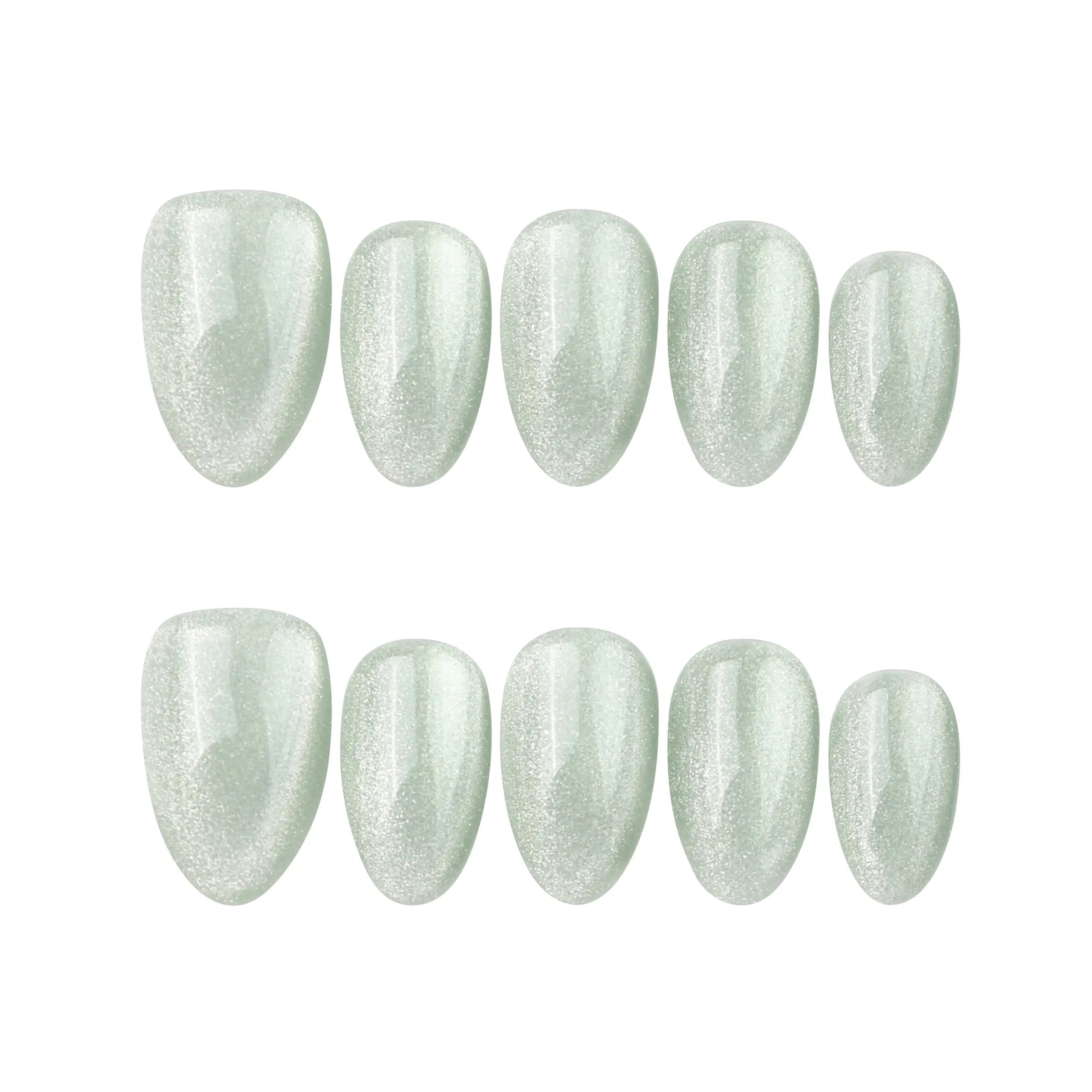 Flat lay of Jade Curve handmade press on nails by Naillover, short almond green nails over white background.