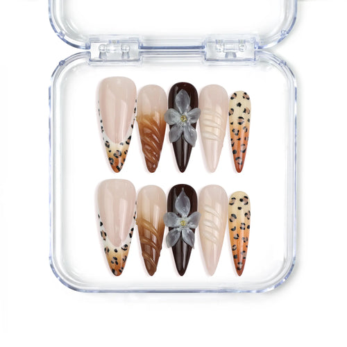 Naillover Singapore handmade stiletto press on nails featuring brown leopard print, black accent nails, and soft flower nail art