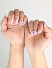 Elegant short Naillover Lilac Whisper Singapore press on nails with beige and lavender ribbon design