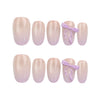 Naillover Lilac Whisper handmade Singapore press on nails set on white background, beige base with lavender ribbons