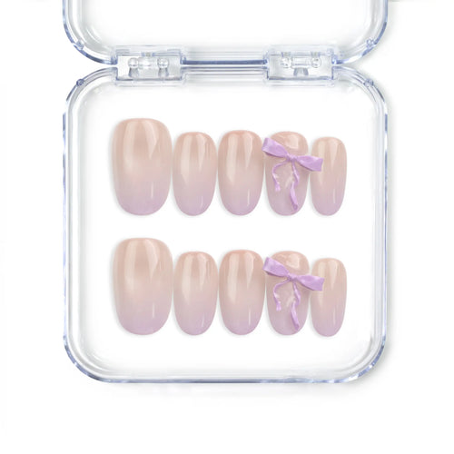 Naillover Lilac Whisper handmade Singapore press on nails with beige base and lavender ribbon accents