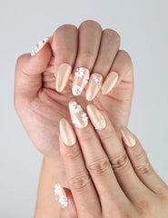Close-up of Naillover’s handmade nails in soft pink with shimmer finish and layered 3D floral art