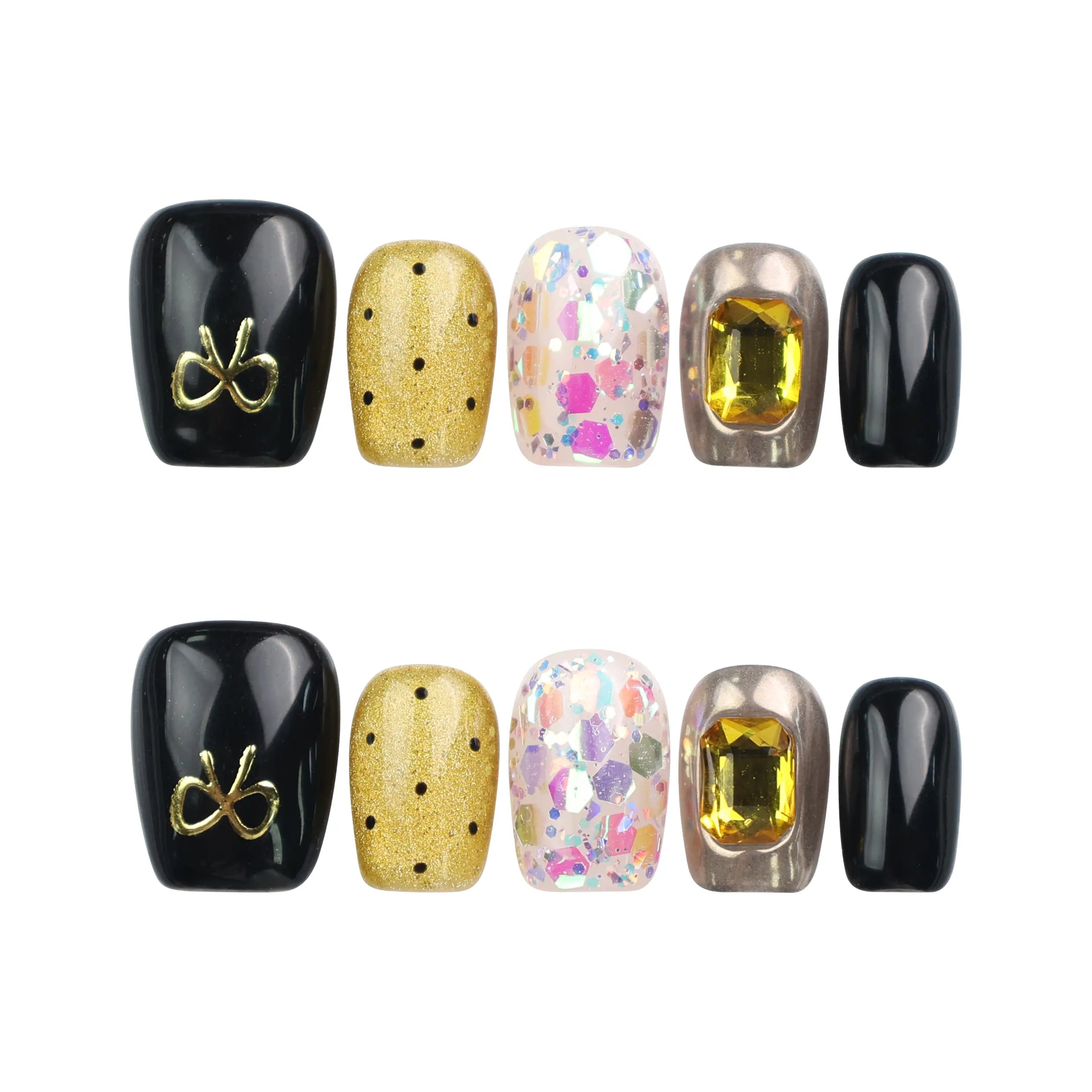 Flat lay of Luxe Mix handmade Singapore press on nails in black, gold, glitter, and gem accents on white background, naillover