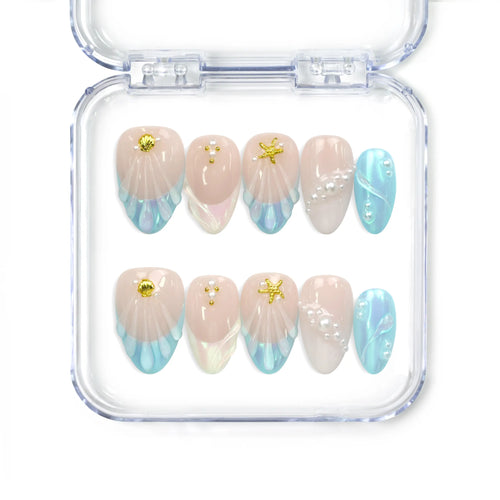 Naillover Marine Dream handmade press on nails with pastel shades, shimmering accents, and gold embellishments from Singapore press on nails collection.